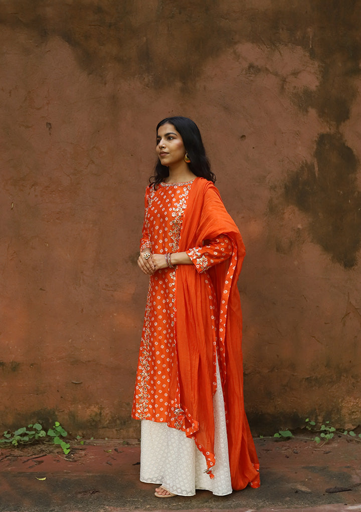 Orange Kota Leheriya Side Buttoned Kurti with Straight Pants and OffWhite  Sequenced Dupatta | Long kurti designs, Designer kurti patterns, Cotton  kurti designs